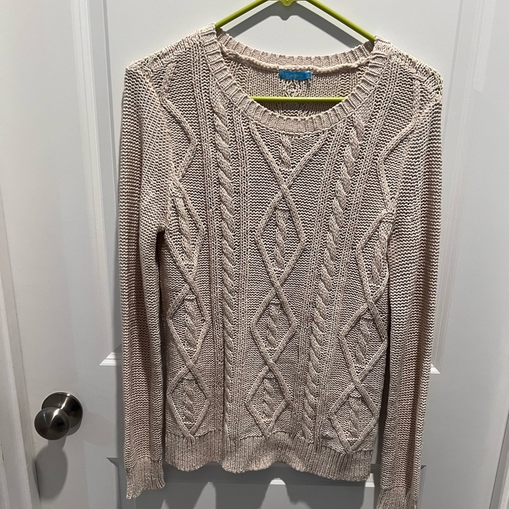 Small cream colored sweater excellent used condition.